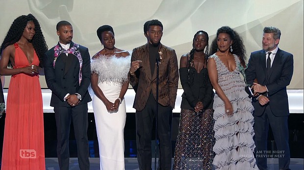 The cast of Black Panther (2018) on stage at the 2019 SAG Awards accepting the award for Best Ensemble.