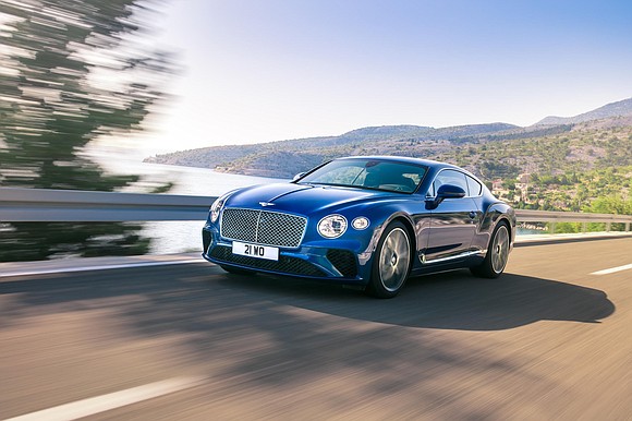 The Bentley Continental GT has a big, powerful V12 engine, but it's no Ferrari. It's also got a classic design …