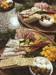 Chef Dorien Murphy's Tomato/Mozz/Balsamic Fig Croustini which features Poached Fig/Goat Cheese/Herb Bread Charcuterie and Crudite along with Italian Meats/Cheeses/Veg