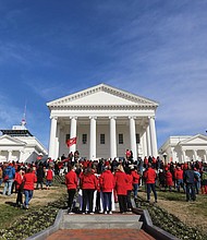 Thousands of teachers, parents, students, administrators, elected officials and education supporters gather Monday at the State Capitol after a march from Monroe Park to demand more money for public education in Virginia. The event was part of Virginia Educators United’s #RedforEd campaign.