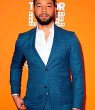 Actor and musician Jussie Smollett performed at his first show since his reported attack last week, tearfully telling fans at the event in Southern California that he is not fully healed but he is doing OK.