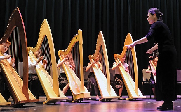 The RPS Harp Ensemble, comprised of middle school students in Richmond Public Schools, add a musical touch to the first State of the Schools presentation Tuesday night by Superintendent Jason Kamras, who is marking his first anniversary in the job. The event was held at Martin Luther King Jr. Middle School in the East End.