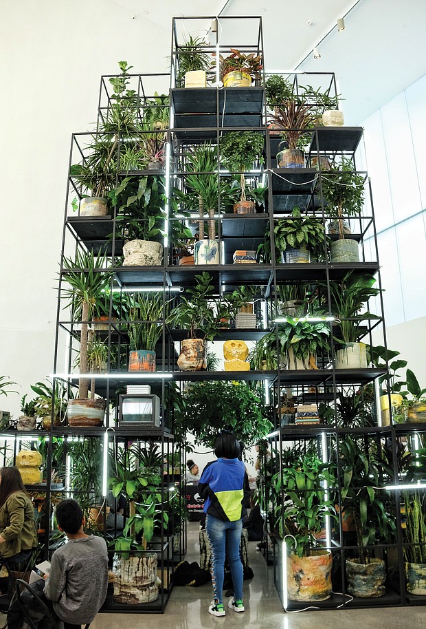 Afroecology at ICA/
The multi-tiered greenery of Rashid Johnson’s “Monument” serves as a centerpiece for a two-day Afroecology program held last weekend at Virginia Commonwealth University’s Institute for Contemporary Art featuring musical guests, visiting artists and craftspersons.  “Monument” is part of the “Provocations” exhibit showcasing Mr. Johnson’s work that will be on view through July 14 at the ICA, 601 W. Broad St. (Sandra Sellars/Richmond Free Press)