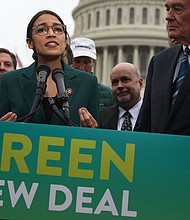 Rep. Alexandria Ocasio-Cortez (D-N.Y.) talks about the Green New Deal on Feb. 7 in Washington