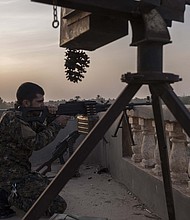 The commander of the US-backed and Kurdish-led Syrian Democratic Forces is asking the US and its coalition partners to provide air support and keep up to 1,500 troops in Syria as part of an effort to stabilize the country.