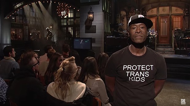 Without saying a word, Don Cheadle used his platform between comedic skits on "Saturday Night Live" to make a statement on behalf of transgender youth.
