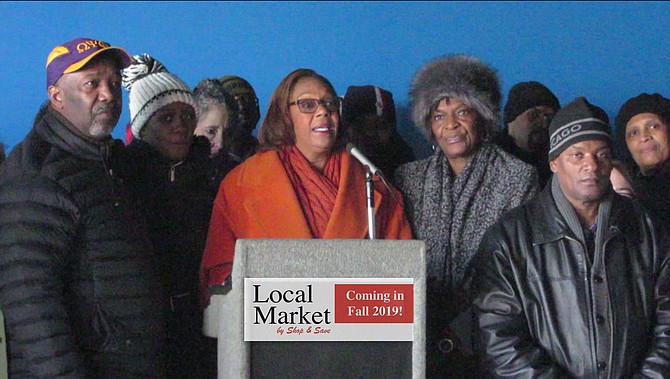 Ald. Leslie Hairston (c) stands with 5th Ward residents at news conference announcing the opening of a new grocery store to replace the vacant Dominick's in Jeffery Plaza, 2101 E. 71st St.  The announcement took place inside the store where construction is underway already. The new Shop & Save Local Market will be a full-service grocery store.  Residents have been without a major grocer since Dominick's went out of business more than five years ago.