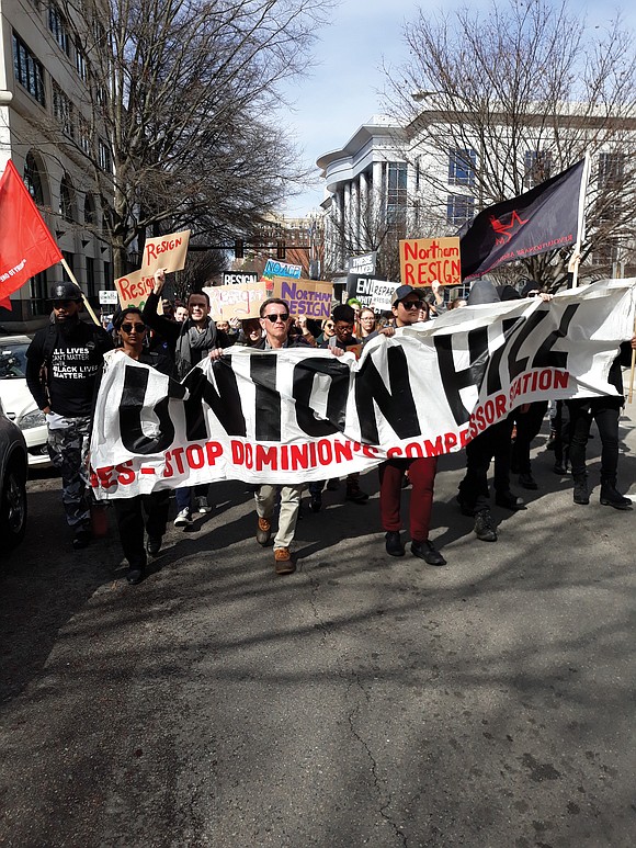 Banks and schools may have been closed Monday, but around 50 political activists descended on Bank Street and went to ...
