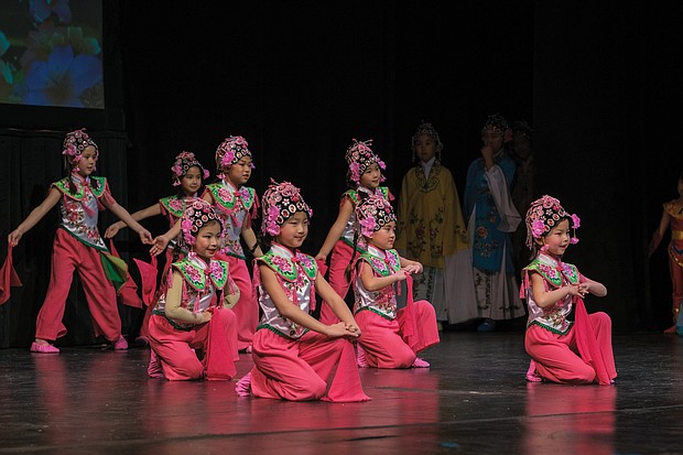 Year of the Earth Pig: It was a celebration of the lunar new year last Saturday at the Virginia Museum of Fine Arts’ ChinaFest: Year of the Earth Pig. Scores of families participated in the festivities that featured an exploration of Chinese art and culture through dance, calligraphy, tea tasting and art activities. Children and young adult dancers from Yu Dance Arts perform traditional Chinese dances with modern Western aesthetics. Performers from RYSE Lion Dance at VCU show off the Fut San style of lion dance that originated in ancient southern China. Youngsters could craft an Earth Pig with air-dry clay, decorate a Chinese folding fan, write their New Year’s wishes on a paper lantern, learn Chinese words and enjoy tai chi demonstrations and storytelling during the event. (Ava Reaves)