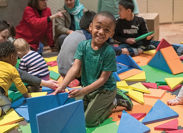 Creating his own fun: Carter Powers, 4, puts his creative powers to use last Saturday during the Virginia Museum of Fine Arts’ ChinaFest: Year of the Earth Pig celebration for the lunar new year. (Ava Reaves)