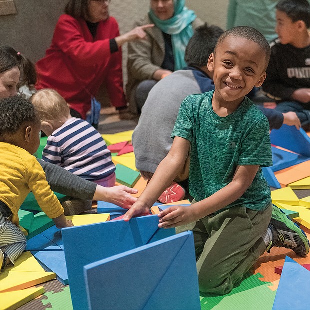Creating his own fun: Carter Powers, 4, puts his creative powers to use last Saturday during the Virginia Museum of Fine Arts’ ChinaFest: Year of the Earth Pig celebration for the lunar new year. (Ava Reaves)