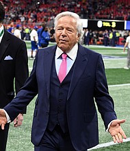 New England Patriots owner Robert Kraft is seen at Super Bowl LIII in Atlanta on February 3. Kraft is being charged with two counts of soliciting someone to commit prostitution, stemming from a raid in a day spa in Florida, police said.