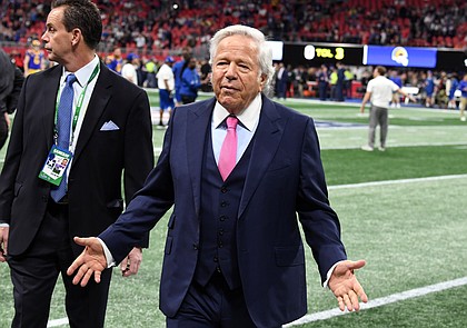 New England Patriots owner Robert Kraft is seen at Super Bowl LIII in Atlanta on February 3. Kraft is being charged with two counts of soliciting someone to commit prostitution, stemming from a raid in a day spa in Florida, police said.