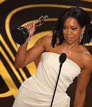 Best Supporting Actress nominee for ‘If Beale Street Could Talk’ Regina King accepts her Oscar during the 91st Annual Academy Awards at the Dolby Theatre in Hollywood, California on February 24, 2019. (Credit: Valerie Macon/AFP/Getty Images)