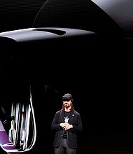 Microsoft's technical fellow Alex Kipman reveals "HoloLens 2" during a presentation at the Mobile World Congress.