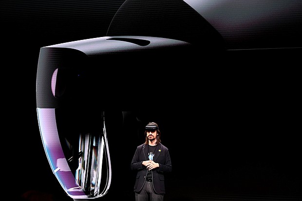 Microsoft's technical fellow Alex Kipman reveals "HoloLens 2" during a presentation at the Mobile World Congress.