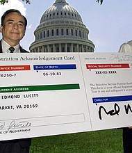 Director of the US Selective Service System, Alfred Rascon (L) and David Edmond Lucitt, 18, of Haymarket, Virginia, July 11, 2001. US District Court Judge Gray Miller ruled late Friday that the Military Selective Service Act's male-only registration is unconstitutional.