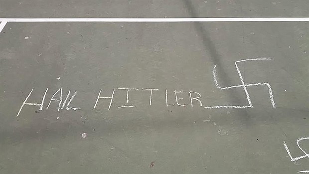 Anti-Semitic symbols and words were found drawn in chalk over the weekend in an elementary schoolyard in New York City.
