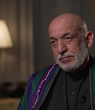 The US special representative for Afghanistan has met with one of the founding members of the Taliban for the first time, as the latest round of peace talks resumed in Qatar.