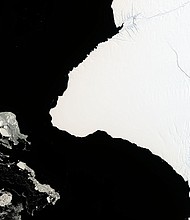 A satellite image of Antarctica's Brunt Ice Shelf shows it with few cracks in a 1986 photo, lbut a 2019 image shows two clearly visible cracks.
