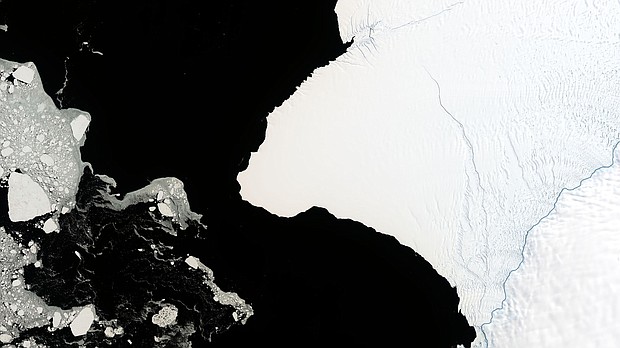 A satellite image of Antarctica's Brunt Ice Shelf shows it with few cracks in a 1986 photo, lbut a 2019 image shows two clearly visible cracks.