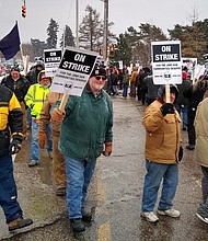 General Electric completed the spinoff off its century-old railroad division on Monday. The Erie, PA locomotive factory is facing its first open-ended strike since 1969-1970.