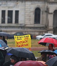 Protesters from around the state converge Saturday on the Capitol continuing their call for the resignation of Gov. Ralph S. Northam. One sign also called for Lt. Gov. Justin E. Fairfax’s impeachment.