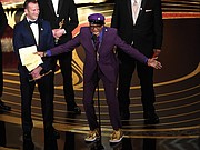 A gleeful Spike Lee gives an impassioned acceptance speech Sunday upon winning the Academy Award for best adapted screenplay for “BlacKkKlansman.”