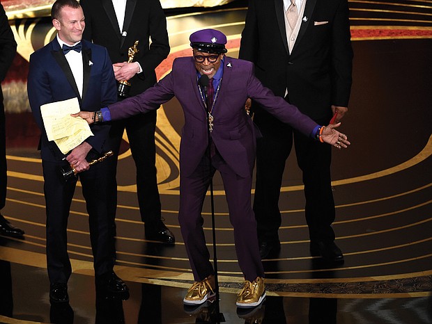 A gleeful Spike Lee gives an impassioned acceptance speech Sunday upon winning the Academy Award for best adapted screenplay for “BlacKkKlansman.”