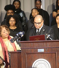 Honoring the Richmond 34-
Elizabeth Johnson Rice listens as Virginia Union University President Hakim J. Lucas reads a proclamation honoring Ms. Johnson Rice and the 33 other VUU students who were arrested on Feb. 22, 1960, while protesting all-white lunch counters and restaurants at the former Thalhimer’s department store in Downtown. The Richmond 34, as the demonstrators have become known, were honored during a chapel service Feb. 21 at VUU. (Regina H. Boone/Richmond Free Press)