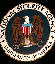 The seal of the National Security Agency (NSA) hangs at the Threat Operations Center inside the NSA. The National Security Agency has stopped using a surveillance program in recent months that relied on bulk data collected from US domestic phone records, according to a Republican congressional official.