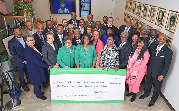 Dr. Glenda Glover (fourth from the left) and 31 HCBU presidents being awarded a total of $1.6 million at AKA headquarters in Chicago. (Photo credit- Elliot Powell)