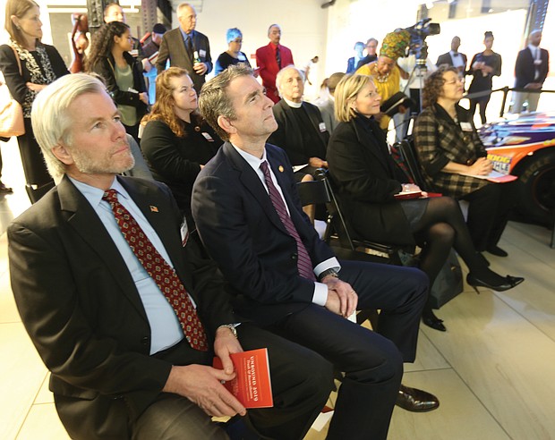 ‘Unbound 2019: Truth & Reconciliation’:
In one of his first public appearances since the blackface scandal, Gov. Ralph S. Northam, second from left, and former Gov. Bob McDonnell, left, attend the opening of “Unbound 2019: Truth & Reconciliation” on Feb. 28, at The Gallery at Main Street Station. This is the first part of a yearlong exhibition launched by the Richmond Slave Trail Commission to tell the stories of Africans in the Americas before 1619 through the present day. Located on the first floor, the exhibition is open to the public without charge 8 a.m. to 5 p.m. daily at the station, 1500 E. Main St. Under Gov. McDonnell’s administration, the state put up $11 million for various historical projects related to memorializing the enslaved in Virginia, including the Lumpkin’s Jail site and a related museum in Shockoe Bottom and funds for the improvement of the Richmond Slave Trail. (Regina H. Boone/Richmond Free Press)