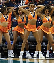 CIAA!: The annual CIAA Tournament is known for its fun — inside and outside the basketball arena. And this year in Charlotte, N.C., was no exception, as HBCU alumni, fans and family enjoyed four days of food, fun and activities in the Queen City. The renowned and often-imitated Virginia State University Woo Woos cheerleading squad shows off the moves they are known for during the game. (photos by Randy Singleton)