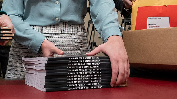 President Donald Trump delivered a 2020 budget to Democrats that cuts spending across the board yet still isn't projected to balance for 15 years, even with ambitious economic growth forecasts.