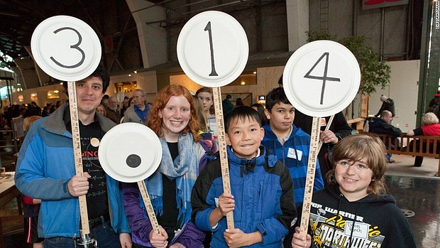 The Exploratorium in San Francisco hosts an annual parade on Pi Day, where people make number signs and march in order of pi's digits.