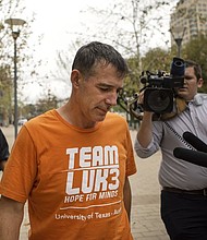 UT-Austin men's tennis coach Michael Center