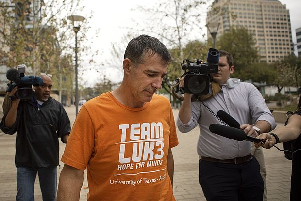 UT-Austin men's tennis coach Michael Center