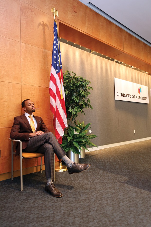 Confidently waiting: Columnist Zachary R. Woods, author of “Uncensored: My Life and Uncomfortable Conversations at the Intersection of Black  and White America,” listens as he is introduced as the first speaker of the 2019 Carole Weinstein Author Series at the Library of Virginia in Downtown on March 5. The next speaker in the free series is Khizr Khan, author of “An American Family: A Memoir of Hope and Sacrifice.” He will speak at 5:30 p.m. Thursday, April 4. Details: www.lva.virginia.gov. (Regina H. Boone/Richmond Free Press)