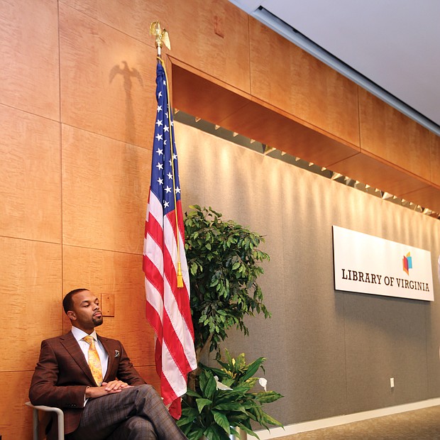 Confidently waiting: Columnist Zachary R. Woods, author of “Uncensored: My Life and Uncomfortable Conversations at the Intersection of Black  and White America,” listens as he is introduced as the first speaker of the 2019 Carole Weinstein Author Series at the Library of Virginia in Downtown on March 5. The next speaker in the free series is Khizr Khan, author of “An American Family: A Memoir of Hope and Sacrifice.” He will speak at 5:30 p.m. Thursday, April 4. Details: www.lva.virginia.gov. (Regina H. Boone/Richmond Free Press)