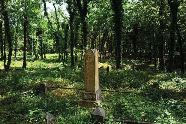 The photo shows the condition of the gravesite of noted newspaperman John Mitchell Jr. in May 2018.