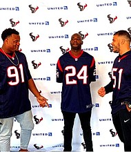 Texans players Carlos Watkins, Jonathan Joseph, and Dylan Cole mix and mingles with United Airlines customers and employees