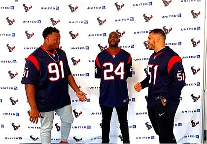 Texans players Carlos Watkins, Jonathan Joseph, and Dylan Cole mix and mingles with United Airlines customers and employees