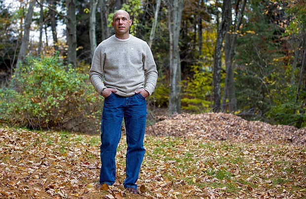 Jeremy Richman stands the backyard of his home in 2013. His daughter Avielle Richman was one of 20 Sandy Hook Elementary School students killed in a mass shooting on December 14, 2012. He died of an apparent suicide and was found in his Connecticut office building on Monday, March 25 Newtown police said.