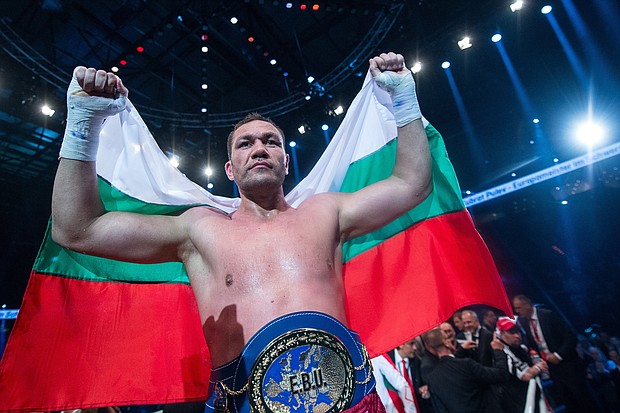 Kubrat Pulev, the 37-year-old Bulgarian heavyweight champion who knocked out Bogdan Dinu in Costa Mesa, California, over the weekend was so "elated" after his victory, he decided to kiss the female reporter who interviewed him afterward.