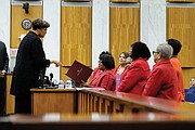 City Councilwoman Ellen F. Robertson, 6th District, left, presents President Connie Cuffee and members of Delta Sigma Theta Sorority’s Richmond Alumnae Chapter with a certificate of recognition honoring Ms. Height at Monday night’s City Council meeting.