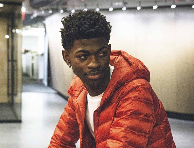 Atlanta's Lil Nas X has had a viral hit with the song "Old Town Road," which Billboard has reportedly pulled from its country music charts.