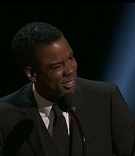 Comedian Chris Rock ripped into Jussie Smollett with a series of jokes Saturday at the NAACP Image Awards, where the actor was nominated for his role on the Fox series "Empire."