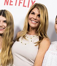 The actress was caught on video by the paparazzi this weekend in Los Angeles and said she was sorry, but she couldn't talk about her legal issues.