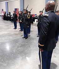 Drill ready: Army Col. Alexander Taylor observes as Cadet 2nd Lt. Taire Hubbard leads Huguenot High School’s Junior ROTC team in a practice Saturday before the Richmond team faced judges in the U.S. Army Junior ROTC Drill Championship. Location: Greater Richmond Convention Center in Downtown. The team that Col. Taylor instructs was one of 103 high school units that came from as far away as Hawaii and Oregon to take part in the daylong event in Richmond. More than 2,500 teens showcased their military abilities at the event. Richmond beat out six other cities to host the championship for the first time. Army officials said they hope to return next year. (Jeremy M. Lazarus/Richmond Free Press)